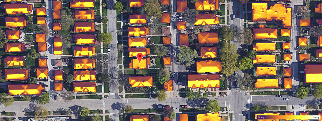 A satellite image highlighting building rooftops based on their solar potential